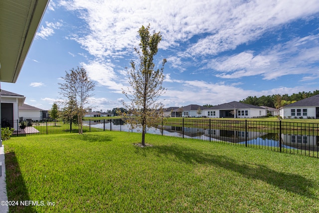 view of yard with a water view