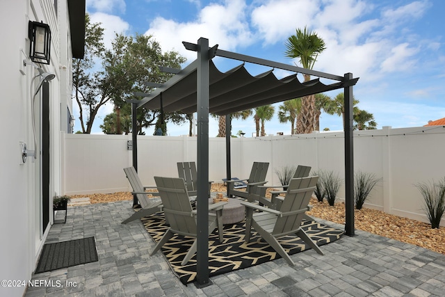 view of patio featuring a pergola