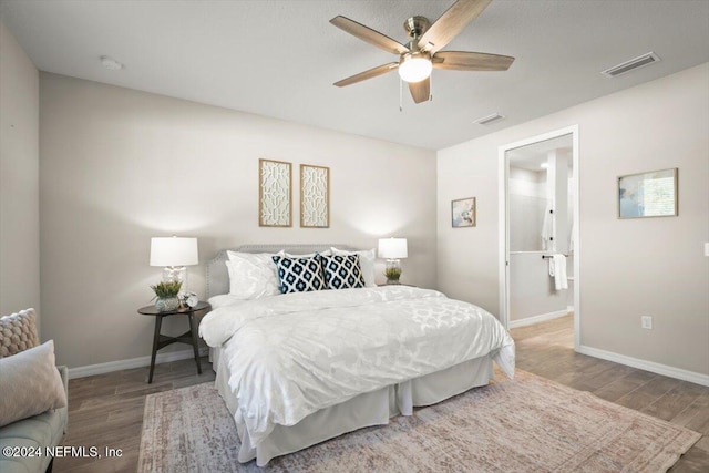 bedroom featuring ceiling fan and hardwood / wood-style flooring