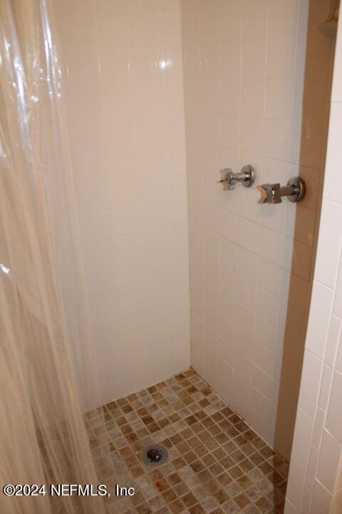 bathroom with walk in shower