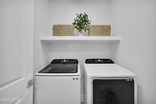 laundry room with separate washer and dryer