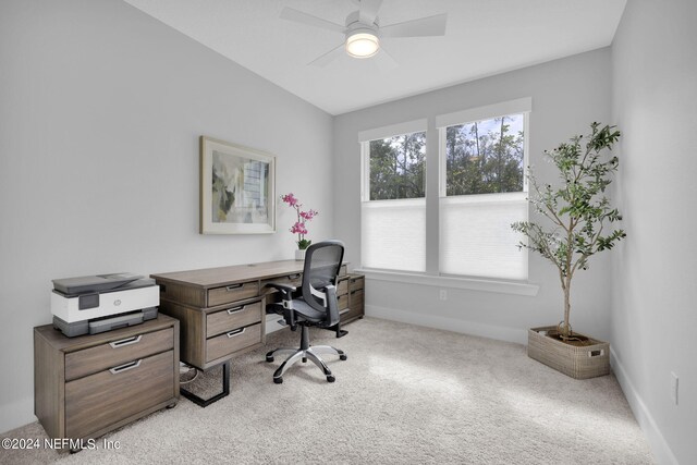 carpeted office with ceiling fan