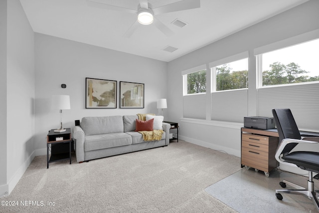 office area with light carpet and ceiling fan