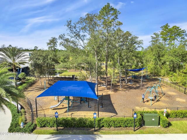 view of pool with a playground