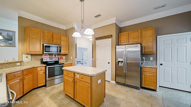 kitchen featuring hanging light fixtures, ornamental molding, a kitchen island, a chandelier, and appliances with stainless steel finishes