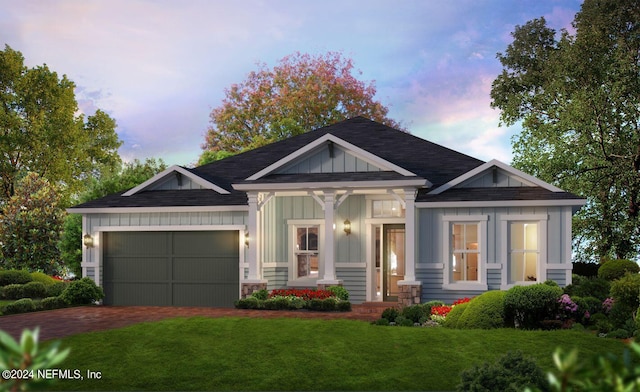 5287 Clapboard Cove Ct, Jacksonville, FL 32226 - view of front of house with a garage, a front yard, board and batten siding, driveway, and a shingled roof