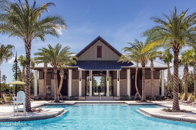 view of swimming pool featuring a patio area