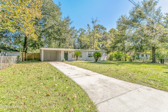 single story home featuring a front yard and a carport