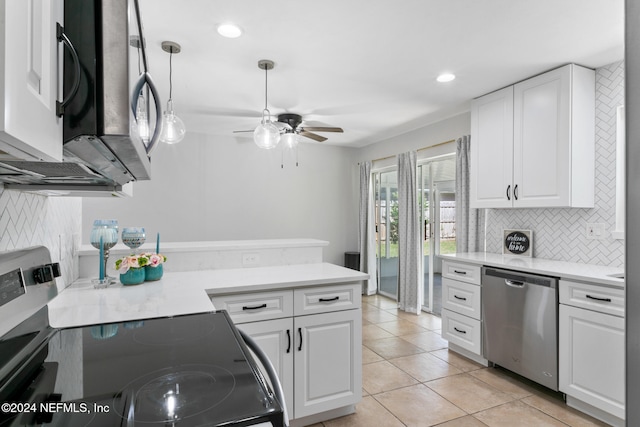 kitchen with tasteful backsplash, ceiling fan, appliances with stainless steel finishes, light tile patterned floors, and white cabinetry