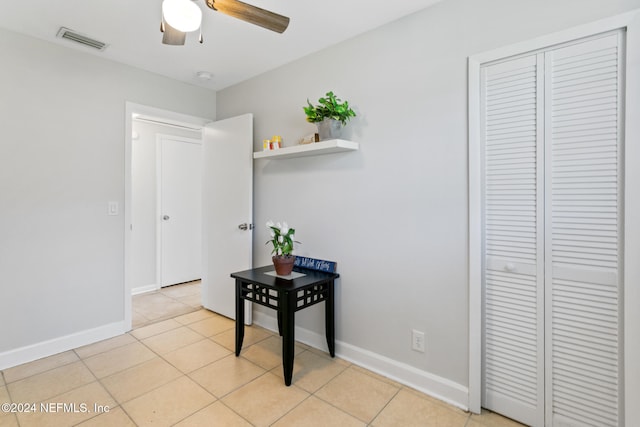 hallway with light tile patterned flooring