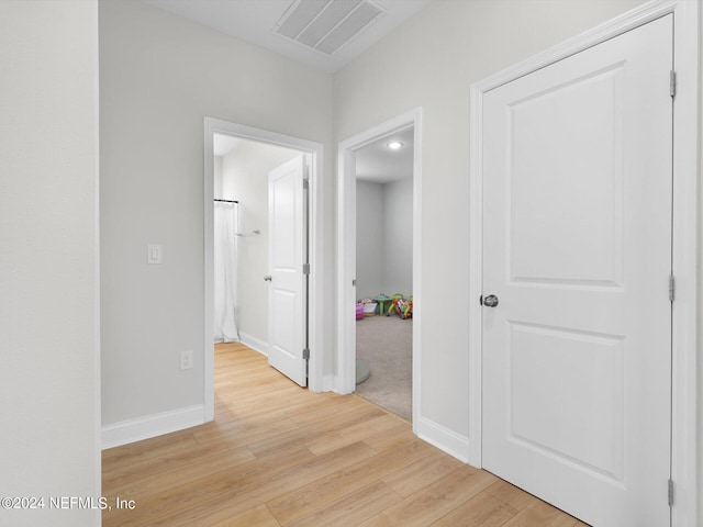 corridor featuring light wood-type flooring