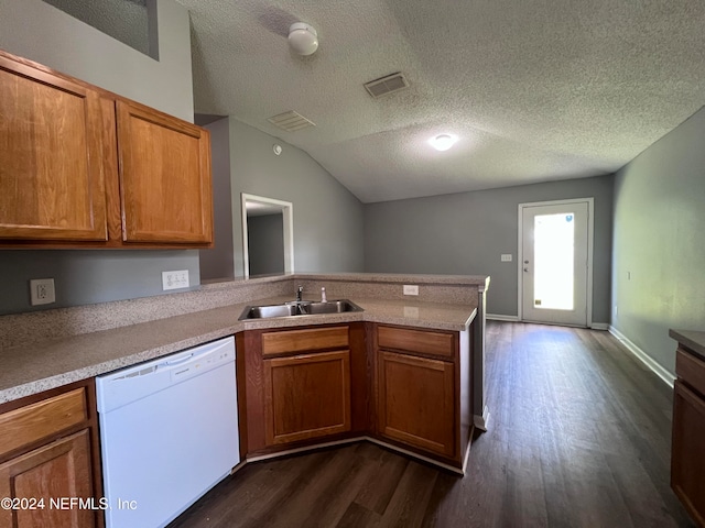 kitchen featuring kitchen peninsula, vaulted ceiling, dishwasher, dark hardwood / wood-style floors, and sink