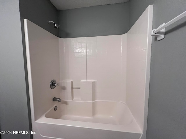 bathroom with shower / bath combination