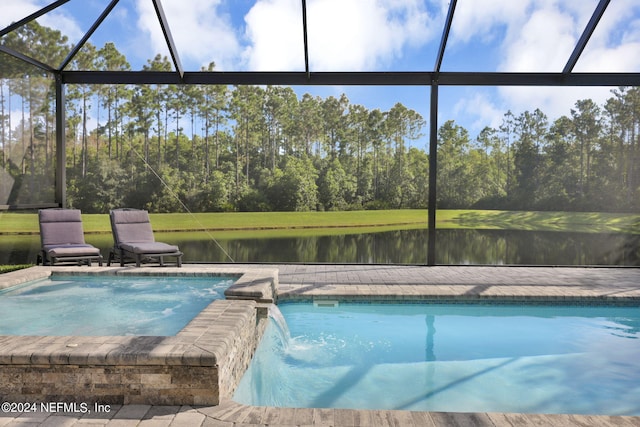 view of swimming pool featuring a water view, glass enclosure, an in ground hot tub, and pool water feature