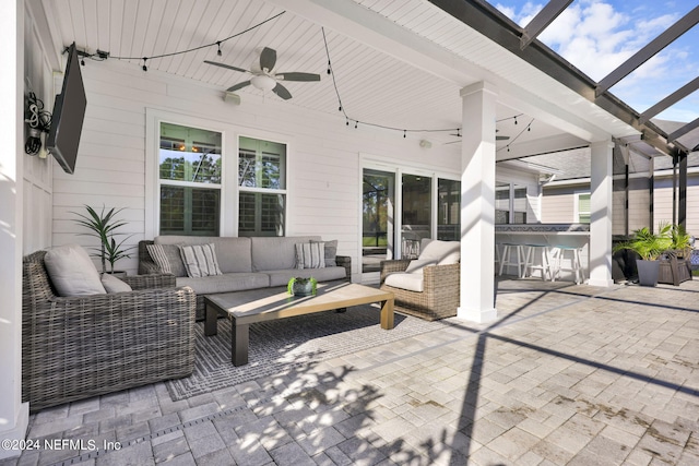 view of patio with ceiling fan, an outdoor hangout area, and a lanai