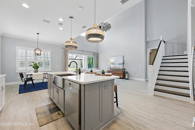 79 Shadow Ridge Trl, Ponte Vedra, FL 32081 - kitchen with a sink, light wood-type flooring, gray cabinetry, dishwasher, and light countertops