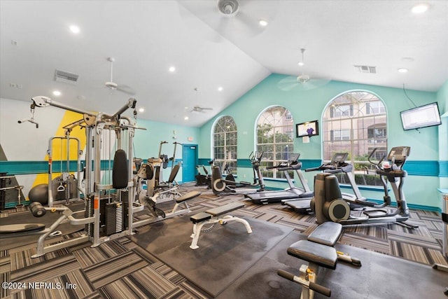 exercise room featuring ceiling fan and lofted ceiling