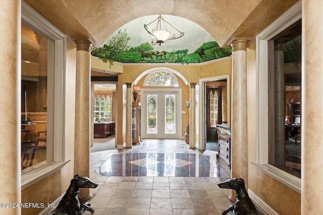 entryway with french doors and ornate columns