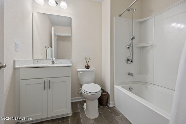 full bathroom featuring shower / tub combo, vanity, and toilet