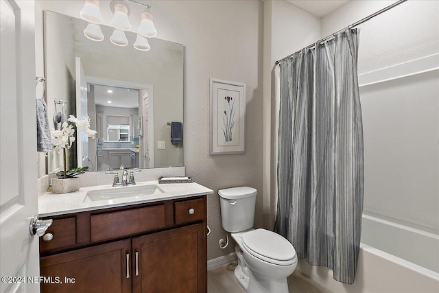 full bathroom featuring vanity, toilet, shower / bathtub combination with curtain, and tile patterned floors