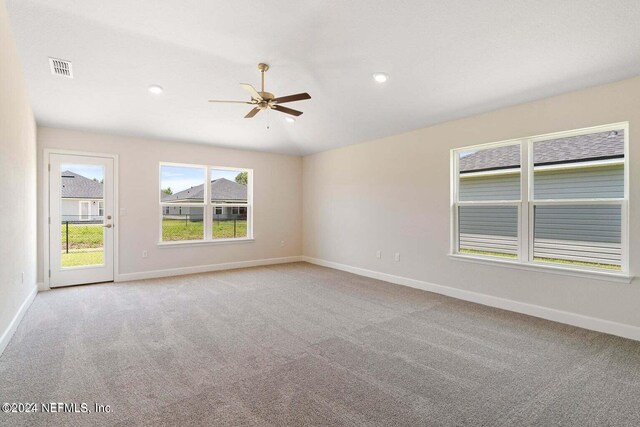 unfurnished room featuring light carpet, ceiling fan, baseboards, and recessed lighting