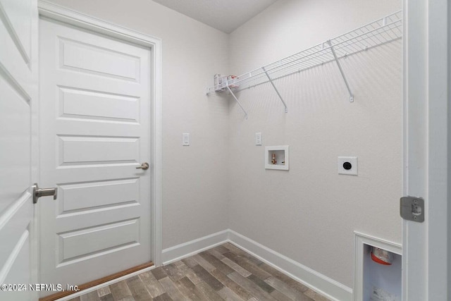 laundry room featuring hookup for an electric dryer, laundry area, washer hookup, wood finished floors, and baseboards