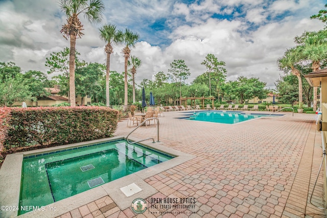 view of pool with a patio area