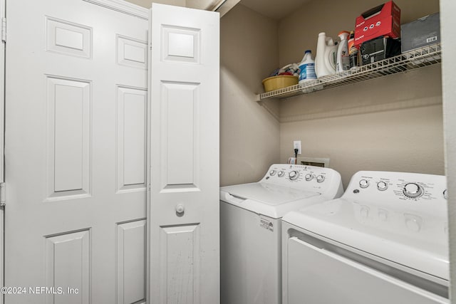 washroom featuring independent washer and dryer