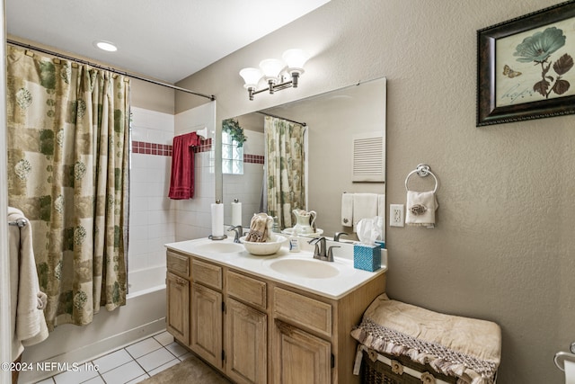 bathroom featuring vanity, shower / bathtub combination with curtain, and tile patterned floors