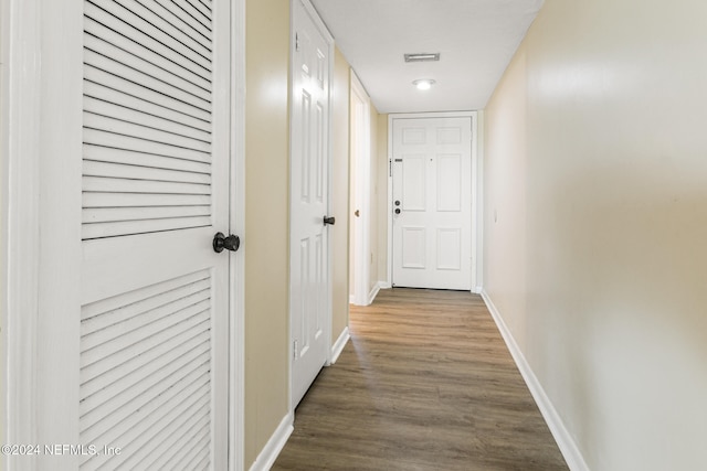 hall featuring wood-type flooring