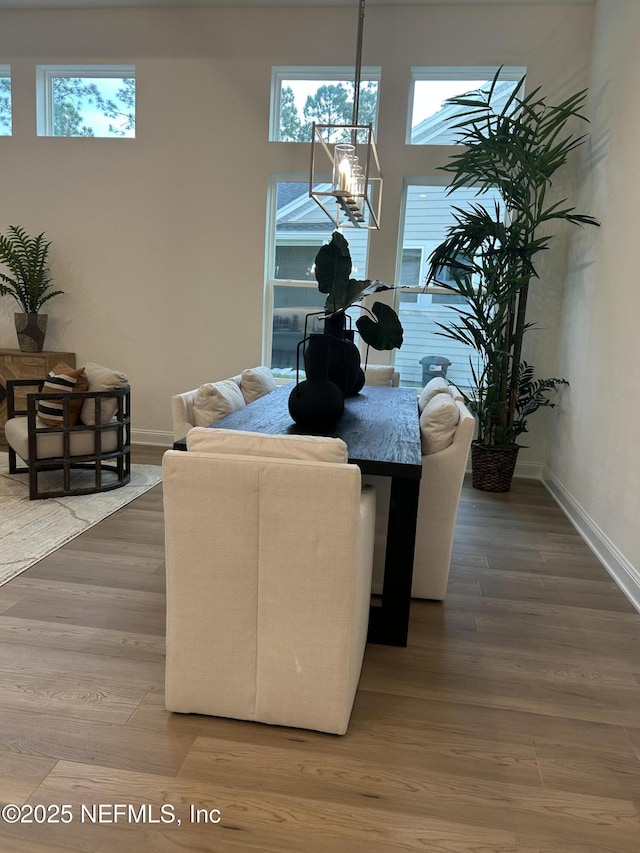 49 Pathway Ct, Saint Johns, FL 32259 - dining space featuring plenty of natural light, baseboards, a chandelier, and wood finished floors