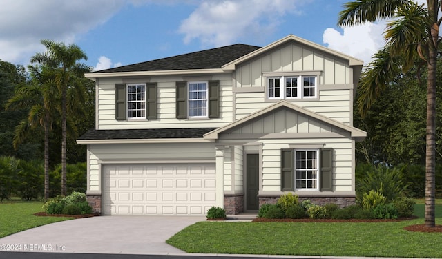 view of front facade with a front yard and a garage