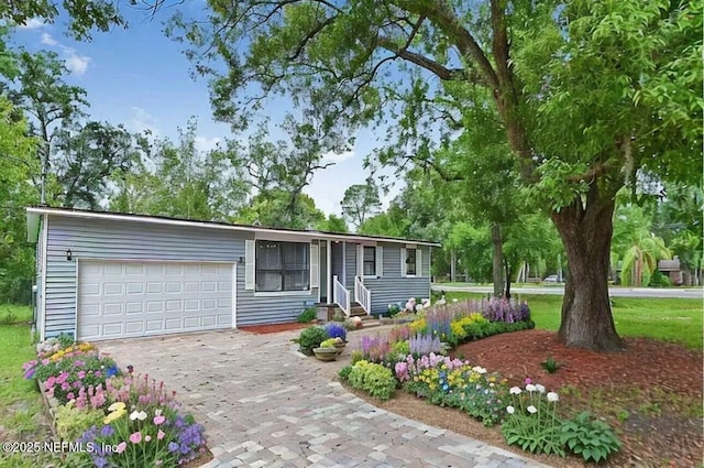 view of front of house with driveway and an attached garage