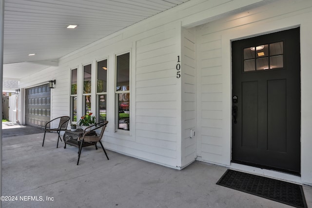 entrance to property with covered porch