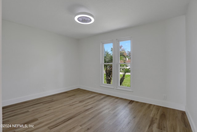 unfurnished room featuring light wood-type flooring