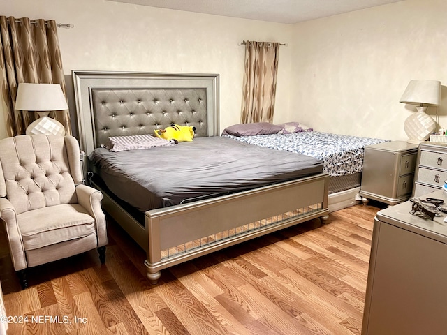 bedroom featuring light hardwood / wood-style flooring