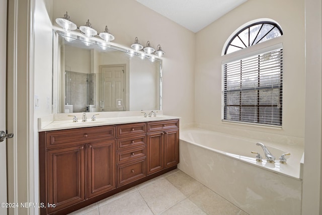 bathroom with vaulted ceiling, vanity, a textured ceiling, shower with separate bathtub, and tile patterned floors