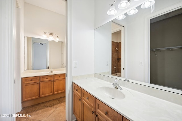 bathroom with vanity and tile patterned floors