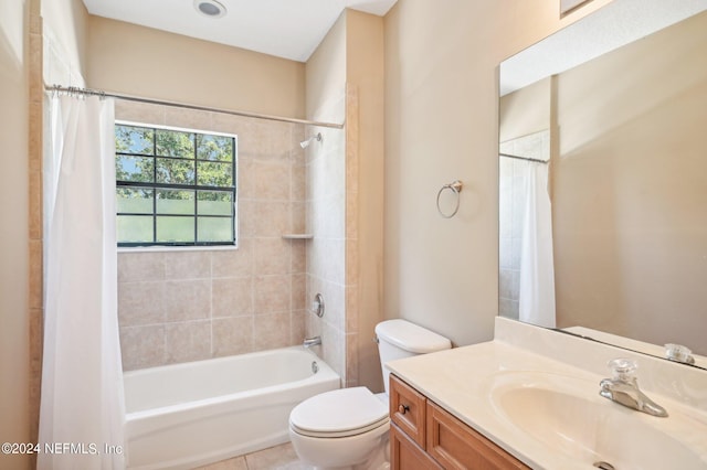 full bathroom featuring vanity, shower / bath combination with curtain, toilet, and tile patterned floors