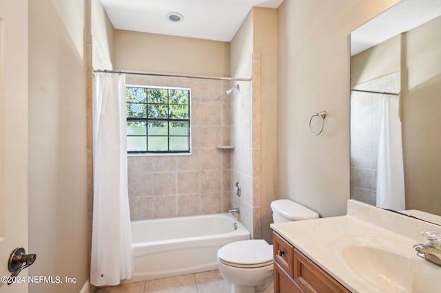 full bathroom with vanity, shower / tub combo, toilet, and tile patterned floors