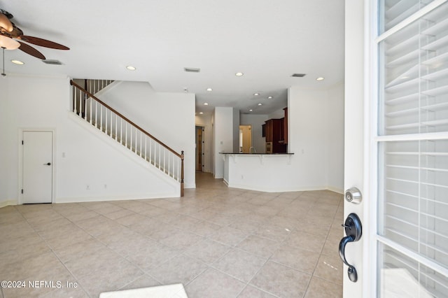 living room with light tile patterned floors