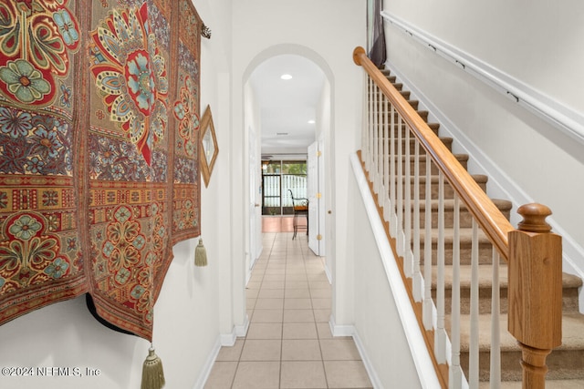 staircase with tile patterned flooring