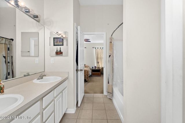 bathroom featuring shower / bath combo, vanity, and tile patterned floors