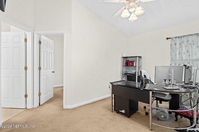 home office featuring ceiling fan, lofted ceiling, and carpet