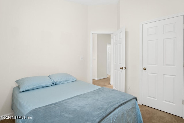 bedroom with light carpet