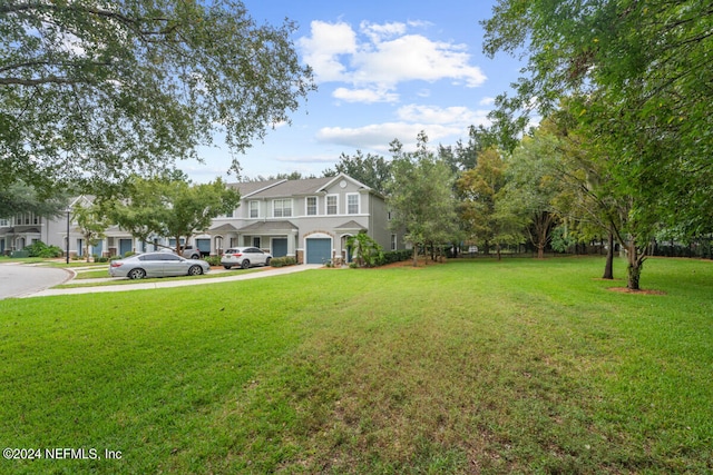 view of front of house with a front lawn