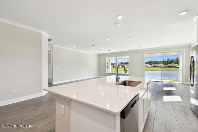 75582 Banyan Way, Yulee, FL 32097 - kitchen with a sink, stainless steel dishwasher, open floor plan, crown molding, and light wood-style flooring