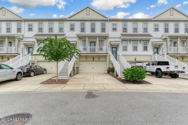 multi unit property featuring a garage