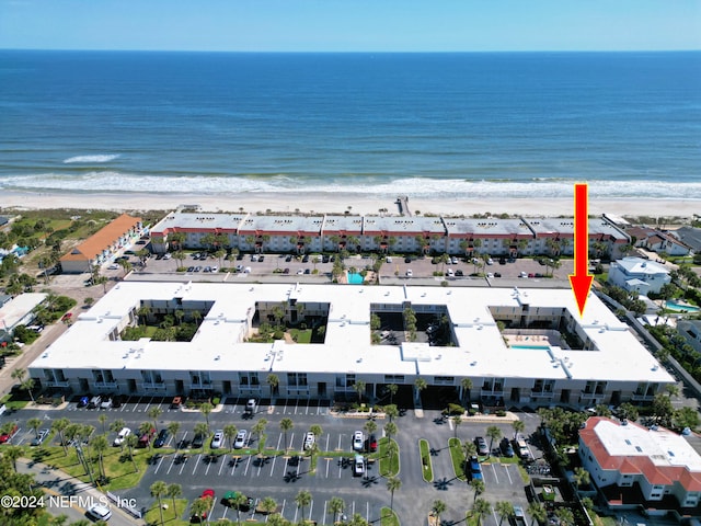 aerial view featuring a water view and a beach view