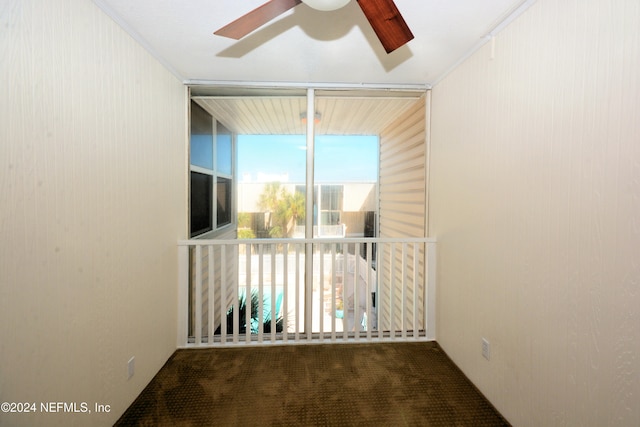 carpeted spare room featuring ornamental molding